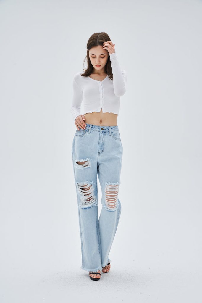 FRINGE TRIM RIPPED WIDE LEG JEANS